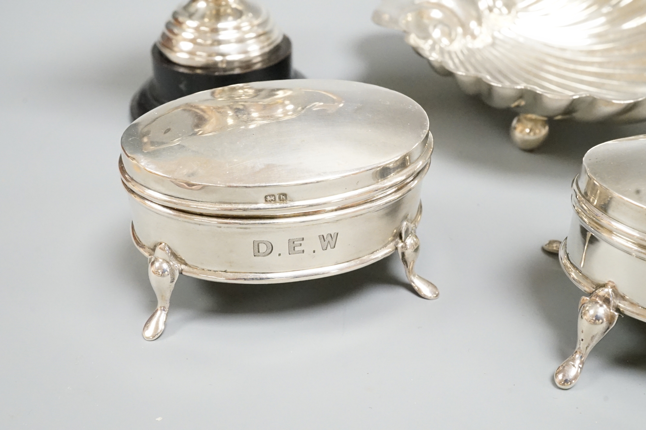Sundry silver including cream and sugar, trinket boxes, butter shell, toilet jars, etc.